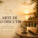 Varanda iluminada pelo pôr do sol com livro e chávena de café representando a arte de não discutir, a paz interior e a inteligência emocional.